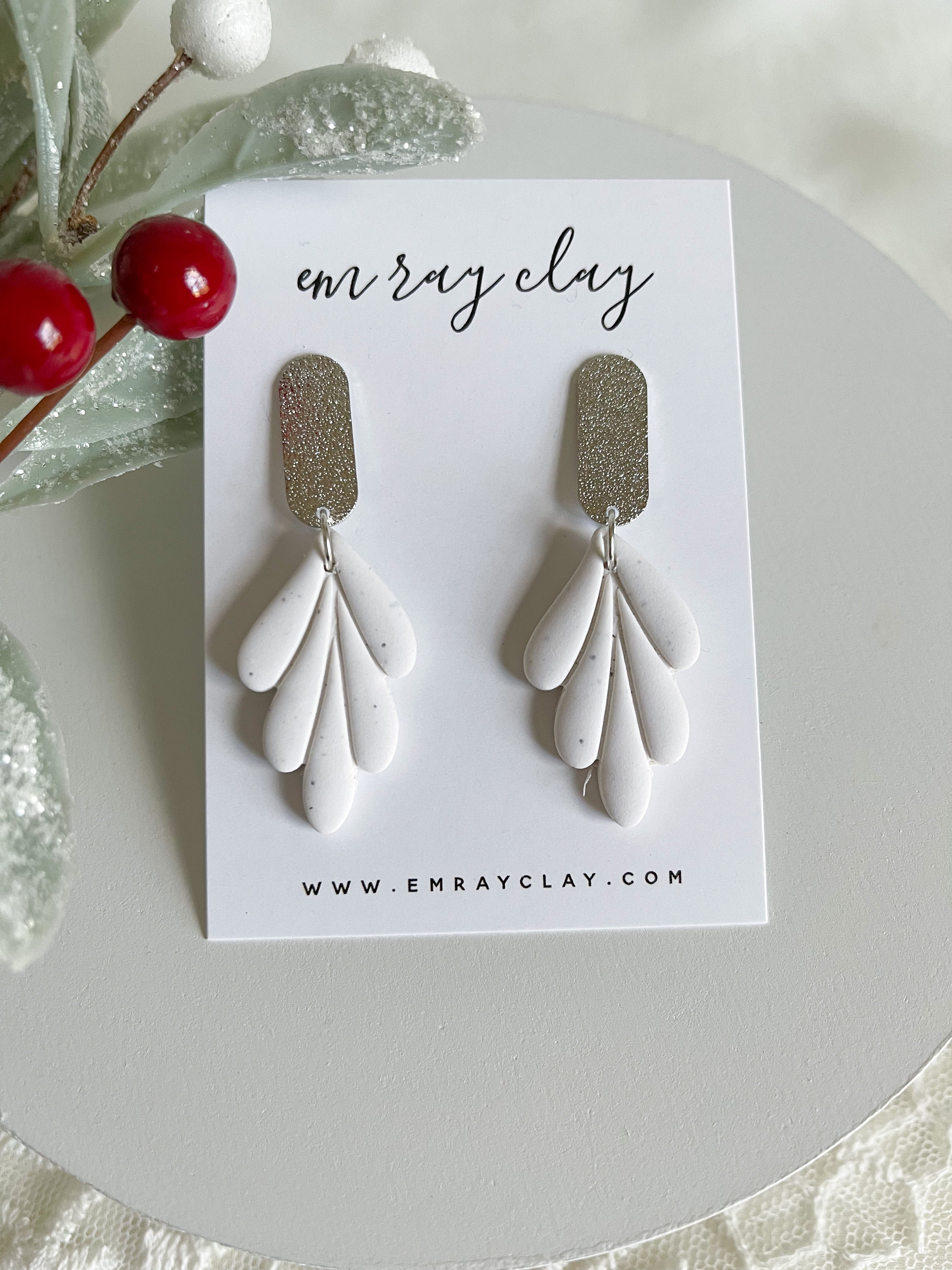 Speckled White Feather Dangles (silver)